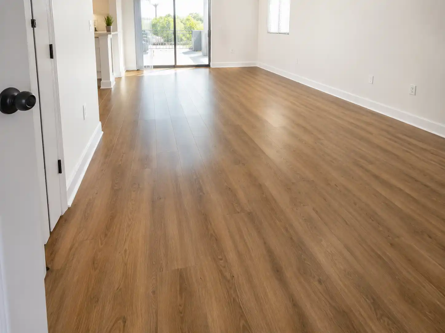 Completed flooring and finishing project featuring continuous warm plank flooring