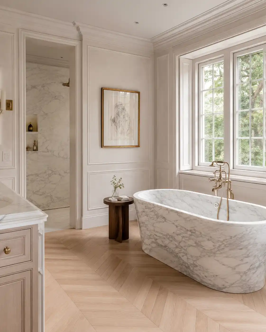 Completed interior renovation featuring marble bath suite & herringbone floor